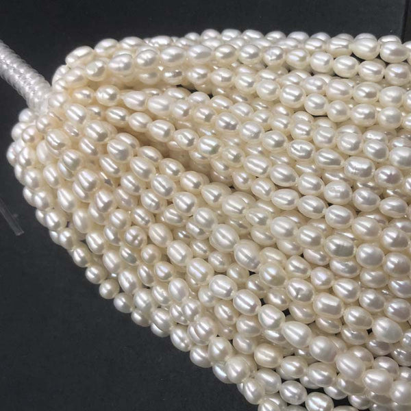 ELEISPL Newly Lots 20 Strands 4-5mm Rice White Freshwater Pearls Strings Free Shipping