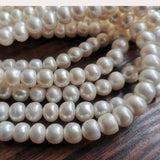 Wholesale 10 Strands 10mm White Freshwater Pearl Strings