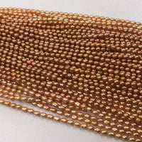 ELEISPL JEWELRY Wholesale 20 strands Near Orange Color  Freshwater Pearl Rice 6*7-8mm #22010334-2