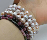 Wholesale 50 strand luster natural color 9*10mm FW pearl Elastic bracelets