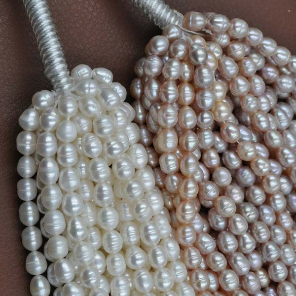 wholesale 6 strands 6-6.5*7-9mm freshwater rice pearl free shipping