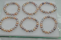 Wholesale 50 strand luster natural color 9*10mm FW pearl Elastic bracelets