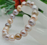 Wholesale 50 strand luster natural color 9*10mm FW pearl Elastic bracelets