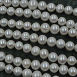 wholesale 11-13mm white freshwater cultured pearl strand 40cm near round beads