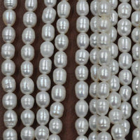 wholesale 6 strands 6-6.5*7-9mm freshwater rice pearl free shipping