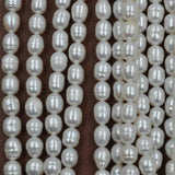 wholesale 6 strands 6-6.5*7-9mm freshwater rice pearl free shipping