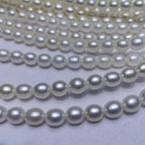 AAA++ Lots fine 6-7mm rice white freshwater pearl strings