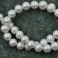 wholesale 11-13mm white freshwater cultured pearl strand 40cm near round beads