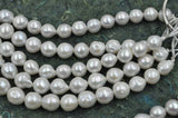 wholesale 9.5-12mm luster furrow freshwater pearl strand Q30168