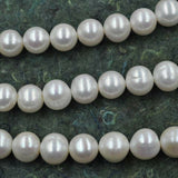 wholesale 11-13mm white freshwater cultured pearl strand 40cm near round beads